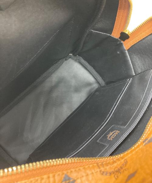MCM（エムシーエム）MCM (エムシーエム) スタッズリュック ブラウンの古着・服飾アイテム