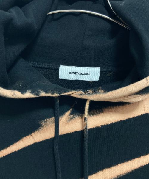 bodysong.（ボディソング）bodysong. (ボディソング) HOODIE-ACIDTUDOR パーカー ベージュ×ブラック サイズ:FREEの古着・服飾アイテム