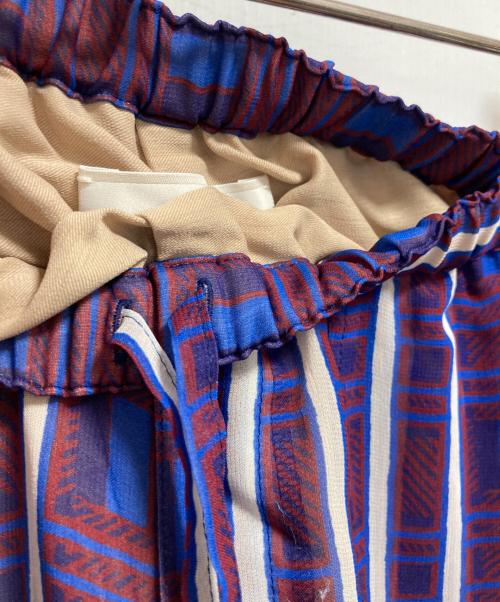 l’heritage martinique（レリタージュ マルティニーク）l’heritage martinique (レリタージュ マルティニーク) 総柄イージーパンツ レッド×ブルー サイズ:FREE 未使用品の古着・服飾アイテム