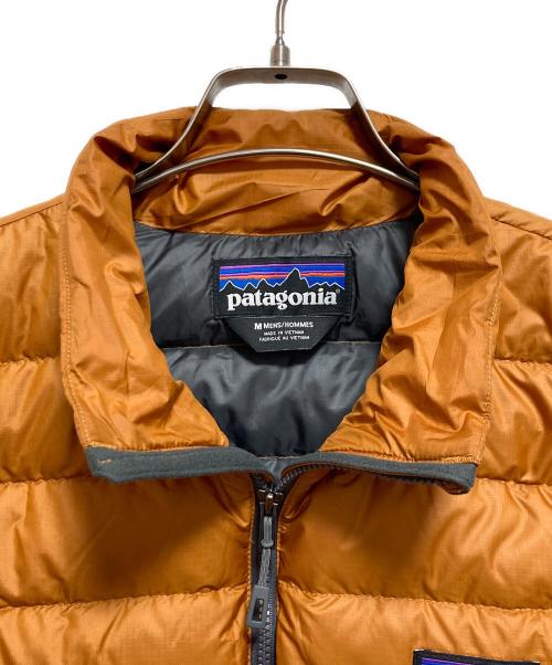 Patagonia（パタゴニア）Patagonia (パタゴニア) ダウンセーターベスト オレンジ サイズ:Mの古着・服飾アイテム