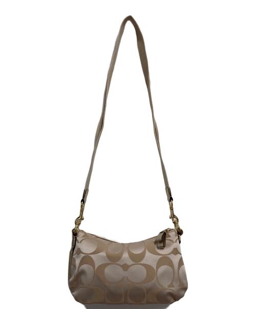 COACH（コーチ）COACH (コーチ) ポピー デイジー シグネチャー2WAYバッグ ベージュの古着・服飾アイテム