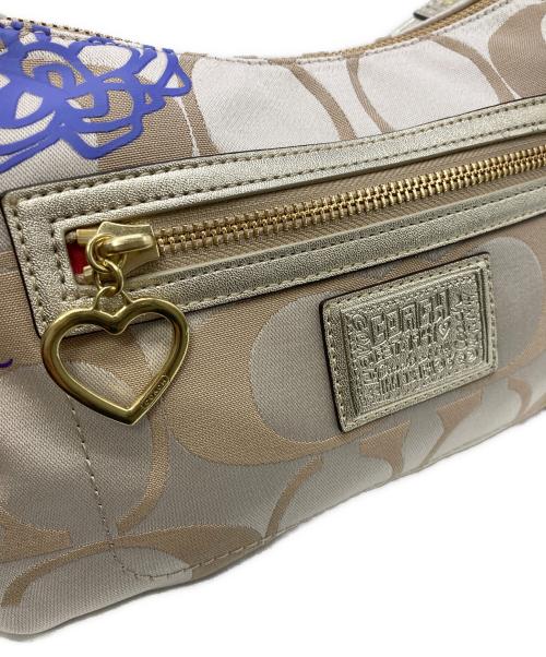 COACH（コーチ）COACH (コーチ) ポピー デイジー シグネチャー2WAYバッグ ベージュの古着・服飾アイテム