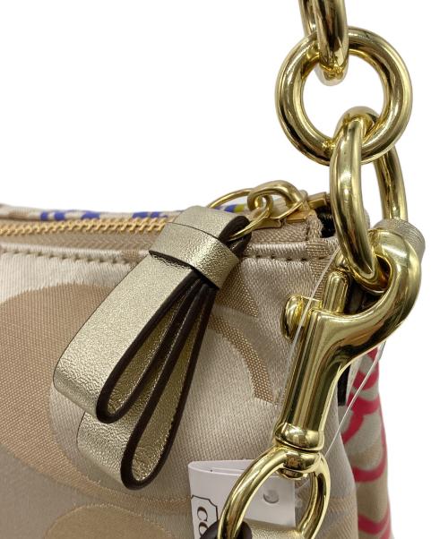 COACH（コーチ）COACH (コーチ) ポピー デイジー シグネチャー2WAYバッグ ベージュの古着・服飾アイテム