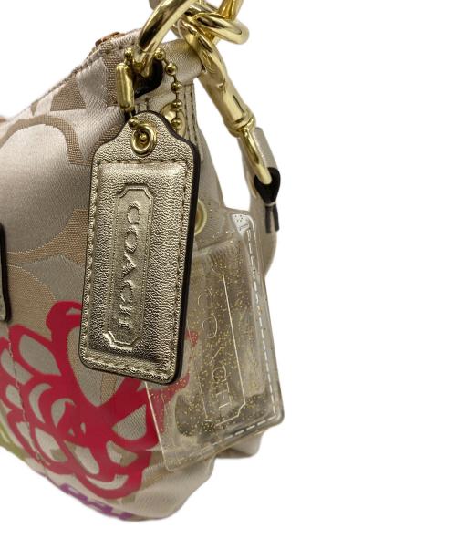 COACH（コーチ）COACH (コーチ) ポピー デイジー シグネチャー2WAYバッグ ベージュの古着・服飾アイテム