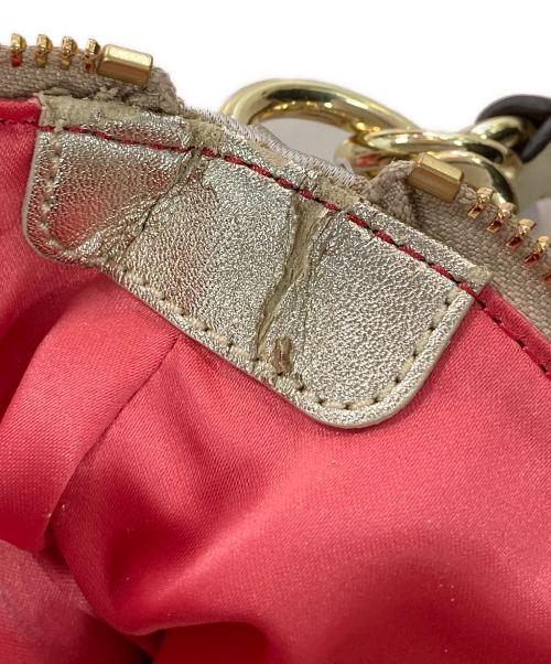 COACH（コーチ）COACH (コーチ) ポピー デイジー シグネチャー2WAYバッグ ベージュの古着・服飾アイテム
