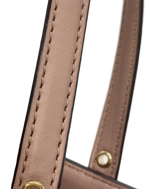 MICHAEL KORS（マイケルコース）MICHAEL KORS (マイケルコース) VOYAGER PVC EW シグネチャー トートバッグ ピンクの古着・服飾アイテム