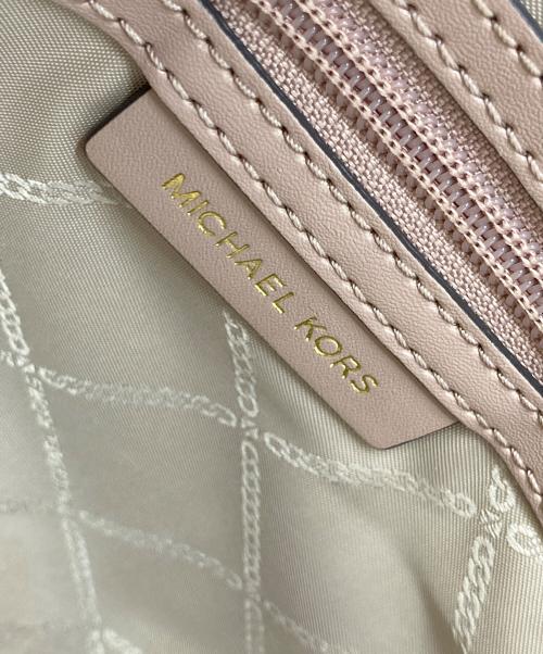 MICHAEL KORS（マイケルコース）MICHAEL KORS (マイケルコース) VOYAGER PVC EW シグネチャー トートバッグ ピンクの古着・服飾アイテム