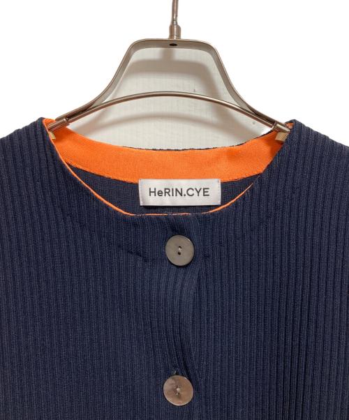 HeRIN.CYE（ヘリンドットサイ）HeRIN.CYE (ヘリンドットサイ) Flare hem knit tops ネイビー×オレンジ サイズ:FREEの古着・服飾アイテム