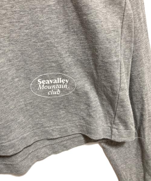 SEA（シー）SEA (シー) SEAVALLY MOUNTAIN CLUB GRAPHIC L/S TEE グレーの古着・服飾アイテム