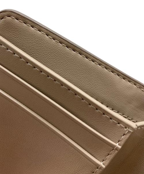 MARC JACOBS（マークジェイコブス）MARC JACOBS (マークジェイコブス) ザ レザー コンパクト ウォレット ミニ グレーの古着・服飾アイテム