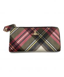 Vivienne Westwood（ヴィヴィアンウエストウッド）の古着「ラウンドファスナー長財布」｜ベージュ×レッド