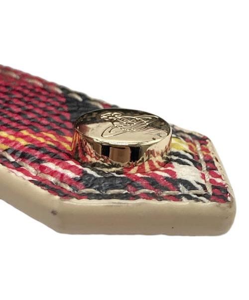 Vivienne Westwood（ヴィヴィアンウエストウッド）Vivienne Westwood (ヴィヴィアンウエストウッド) ラウンドファスナー長財布 ベージュ×レッドの古着・服飾アイテム