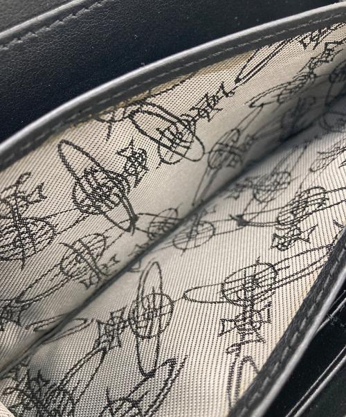 Vivienne Westwood（ヴィヴィアンウエストウッド）Vivienne Westwood (ヴィヴィアンウエストウッド) ラウンドファスナー長財布 ベージュ×レッドの古着・服飾アイテム