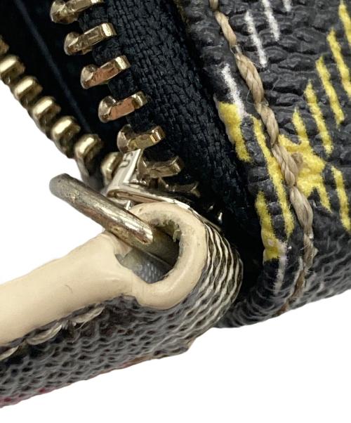 Vivienne Westwood（ヴィヴィアンウエストウッド）Vivienne Westwood (ヴィヴィアンウエストウッド) ラウンドファスナー長財布 ベージュ×レッドの古着・服飾アイテム