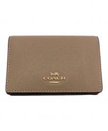 COACH（コーチ）の古着「カードケース」｜ベージュ