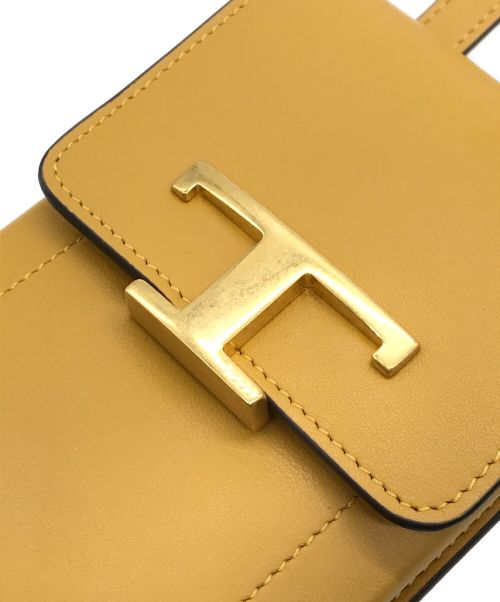 TOD'S（トッズ）TOD'S (トッズ) T タイムレス レザー モバイルフォン ホルダー イエロー サイズ:下記参照の古着・服飾アイテム