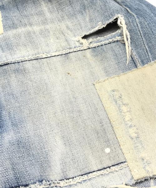 DSQUARED2（ディースクエアード）DSQUARED2 (ディースクエアード) クラッシュリペアデニムパンツ インディゴ サイズ:44の古着・服飾アイテム