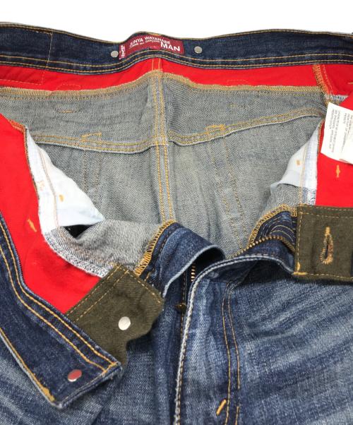 COMME des GARCONS JUNYA WATANABE MAN（コム デ ギャルソン ジュンヤ ワタナベ マン）COMME des GARCONS JUNYA WATANABE MAN (コム デ ギャルソン ジュンヤ ワタナベ マン) LEVI'S (リーバイス) ドッキングデニムパンツ インディゴ サイズ:Lの古着・服飾アイテム