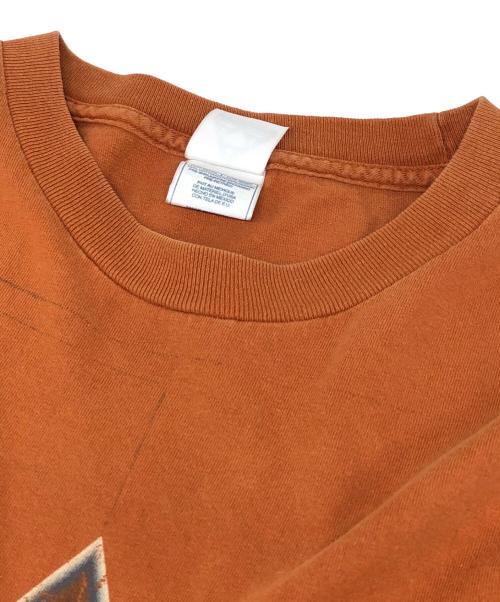 AAA（トリプルエー）AAA (トリプルエー) 狂気プリントTシャツ ブラウン サイズ:XLの古着・服飾アイテム