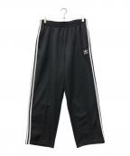 adidasアディダス）の古着「バギーフィット ファイヤーバードトラックパンツ」｜ブラック