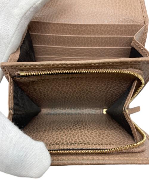 GUCCI（グッチ）GUCCI (グッチ) 2つ折り財布 ベージュの古着・服飾アイテム