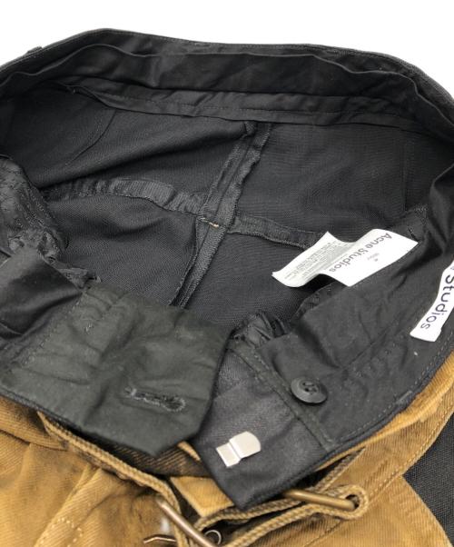 Acne studios（アクネ ストゥディオズ）ACNE STUDIOS (アクネ ストゥディオス) BLACK & TAN BELTED TROUSERS ブラック サイズ:48の古着・服飾アイテム