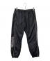 Supreme（シュプリーム）の古着「STRIPED LOGO WARM UP PANT」｜ブラック