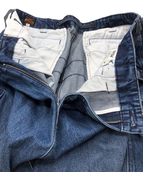 EVISU（エヴィス）EVISU (エヴィス) ウォッシュ大黒刺繍ワイドレッグカーゴジーンズ インディゴ サイズ:XXLの古着・服飾アイテム