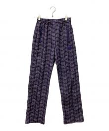 Needles（ニードルズ）の古着「トラックパンツ」｜パープル