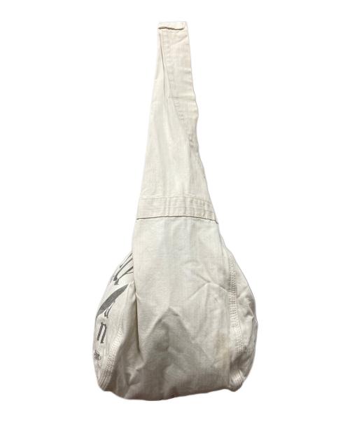 BELAFONTE（ベラフォンテ）BELAFONTE (ベラフォンテ) ニュースペーパーバッグ アイボリーの古着・服飾アイテム