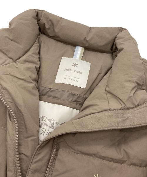 Snow peak（スノーピーク）snow peak (スノーピーク) スタンドネックライトウェイトダウンジャケット ベージュ サイズ:Mの古着・服飾アイテム