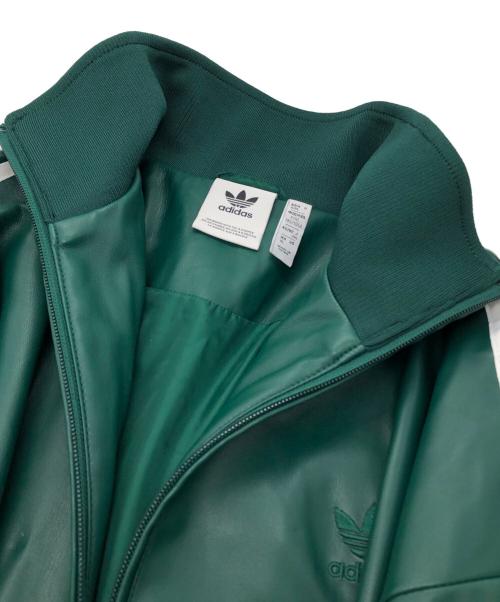 adidas（アディダス）adidas (アディダス) フェイクレザー アディカラー スリーストライプス ルーズ ファイヤーバード トラックスーツジャケット グリーン サイズ:XLの古着・服飾アイテム