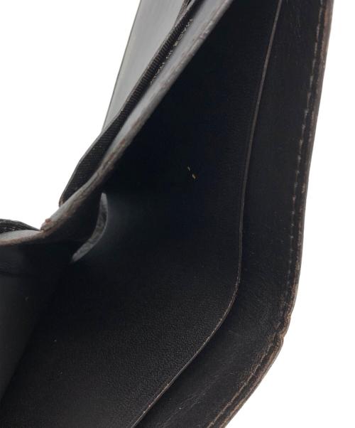 TOM FORD（トムフォード）TOM FORD (トムフォード) 型押し2つ折り財布 ブラウンの古着・服飾アイテム