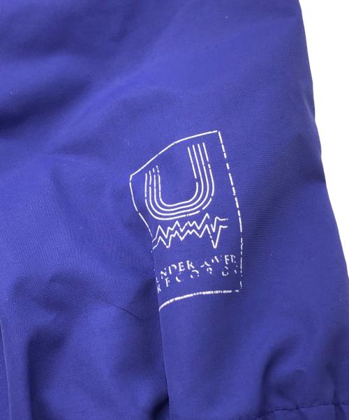 UNDERCOVER（アンダーカバー）UNDERCOVER (アンダーカバー) CAN (キャン・グループ) プリントナイロンコーチジャケット ネイビー サイズ:2の古着・服飾アイテム