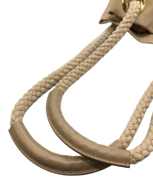 PRADA（プラダ）PRADA (プラダ) マリナースモール Re-Nylon バケットバッグ ブラウンの古着・服飾アイテム