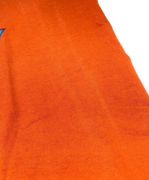 stussy（ステューシー）stussy (ステューシー) The CRASH プリントTシャツ オレンジ サイズ:Sの古着・服飾アイテム