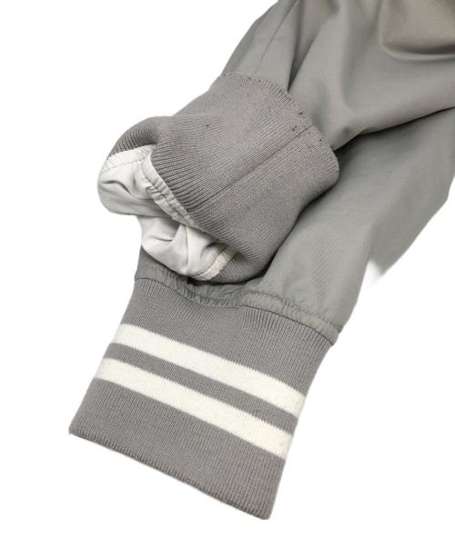 stussy（ステューシー）stussy (ステューシー) Champion (チャンピオン) ヴァーシティーコーチジャケット3 グレー サイズ:Sの古着・服飾アイテム