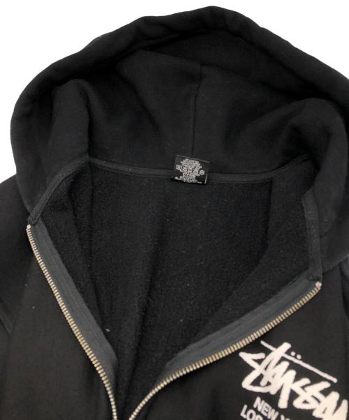 stussy（ステューシー）stussy (ステューシー) ワールドツアー ジップパーカー ブラック サイズ:XLの古着・服飾アイテム