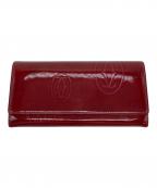 Cartierカルティエ）の古着「ハッピーバースデー フラップロングウォレット」｜レッド