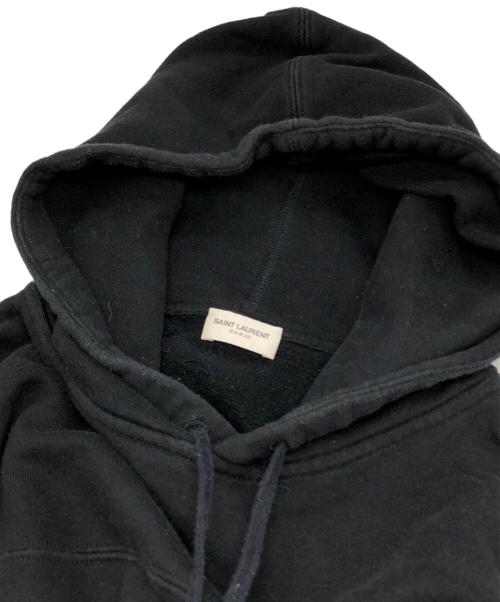 Saint Laurent Paris（サンローランパリ）Saint Laurent Paris (サンローランパリ) ロゴプリントプルオーバーパーカー ブラック サイズ:Lの古着・服飾アイテム