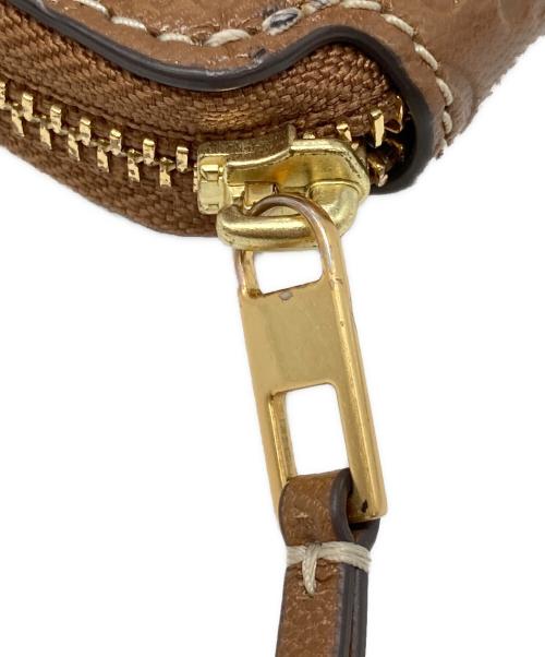 TORY BURCH（トリーバーチ）TORY BURCH (トリーバーチ) Ｔモノグラム ラウンドジップコンパクトウォレット ブラウン サイズ:下記参照の古着・服飾アイテム