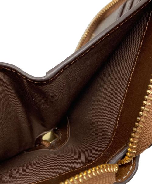 TORY BURCH（トリーバーチ）TORY BURCH (トリーバーチ) Ｔモノグラム ラウンドジップコンパクトウォレット ブラウン サイズ:下記参照の古着・服飾アイテム