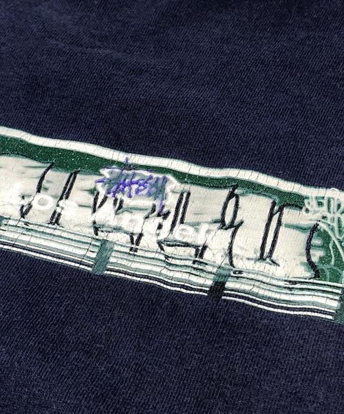 stussy（ステューシー）stussy (ステューシー) プリントTシャツ ネイビー サイズ:Lの古着・服飾アイテム