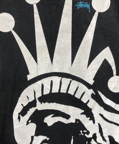 stussy（ステューシー）stussy (ステューシー) 自由の女神 プリントTシャツ ブラック サイズ:Mの古着・服飾アイテム