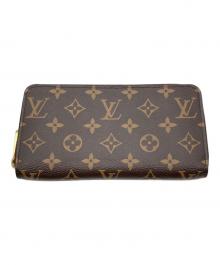 LOUIS VUITTON（ルイ ヴィトン）の古着「ラウンドファスナー財布」｜ブラウン