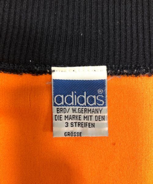 adidas（アディダス）adidas (アディダス) ハイネックトラックジャケット オレンジ サイズ:FREEの古着・服飾アイテム