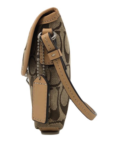 COACH（コーチ）COACH (コーチ) クリップデミ シグネチャーポーチ ベージュの古着・服飾アイテム