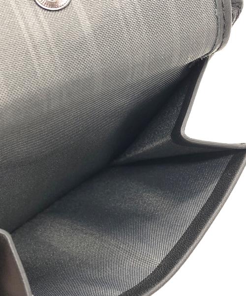 TUMI（トゥミ）TUMI (トゥミ) GBL WALLET W/ COIN POCKET 2つ折り財布/グローバル・ウォレット・ウィズ・コイン・ポケット ブラックの古着・服飾アイテム