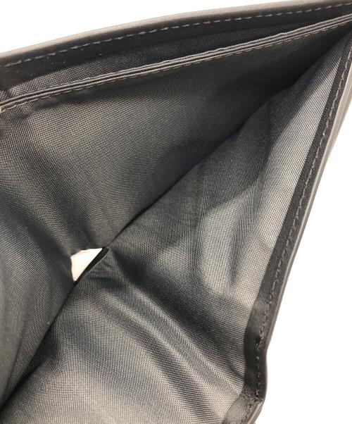 TUMI（トゥミ）TUMI (トゥミ) GBL WALLET W/ COIN POCKET 2つ折り財布/グローバル・ウォレット・ウィズ・コイン・ポケット ブラックの古着・服飾アイテム