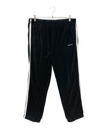SUPREME（シュプリーム）の古着「Studded Velour Track Pant」｜ブラック